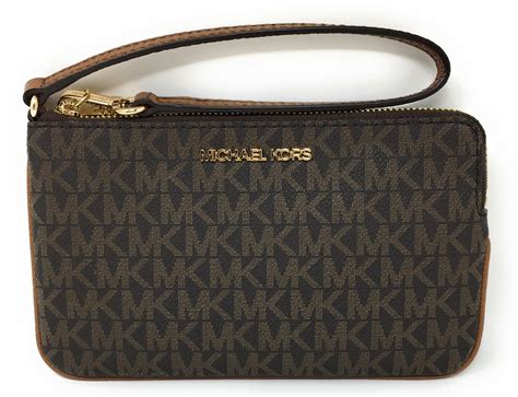 michael kors purse clutch|Michael Kors large wristlet clutch.